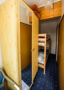 Postel nebo postele na pokoji v ubytování Hotel Kommandørgården