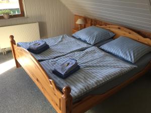 Postel nebo postele na pokoji v ubytování Pension Grandel