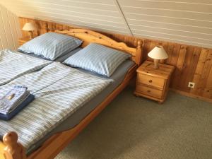 Postel nebo postele na pokoji v ubytování Pension Grandel