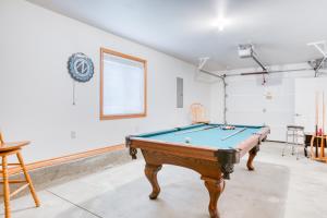 a room with a pool table in it at Spacious Seaside Home with an Ocean View in Seaside