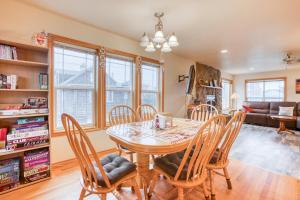 a dining room with a table and chairs at Spacious Seaside Home with an Ocean View in Seaside
