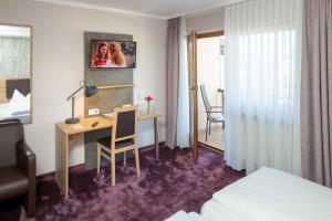 Postel nebo postele na pokoji v ubytování Hotel Pockinger Hof