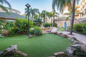 a golf course in the middle of a yard at Cape Canaveral Beach Resort in Cape Canaveral