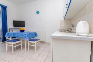 Kuchyň nebo kuchyňský kout v ubytování Apartments Tomislav