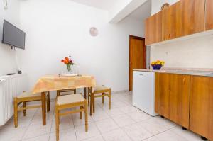 Kuchyň nebo kuchyňský kout v ubytování Apartments Tomislav