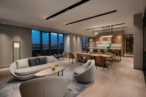 Zona de estar de Citadines Songshan Lake Dongguan