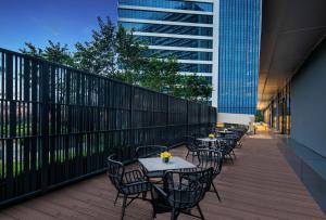 Un balcón o terraza de Citadines Songshan Lake Dongguan