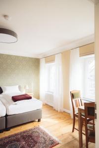 מיטה או מיטות בחדר ב-Altes Pfarrhaus