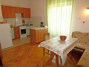 Kuchyň nebo kuchyňský kout v ubytování Apartments Jelka