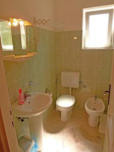 Koupelna v ubytování Apartments Jelka