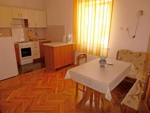Kuchyň nebo kuchyňský kout v ubytování Apartments Jelka + 21 fotografií