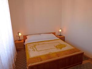 Postel nebo postele na pokoji v ubytování Apartments Jelka