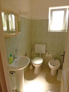 Koupelna v ubytování Apartments Jelka