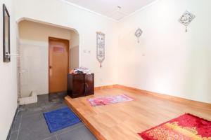 Postel nebo postele na pokoji v ubytování Cempaka Hotel