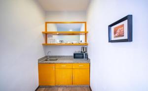 Cucina o angolo cottura di Nova Highlands Hotel