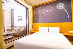Letto o letti in una camera di Nova Highlands Hotel