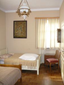 
Łóżko lub łóżka w pokoju w obiekcie Zagrodowa Osada
