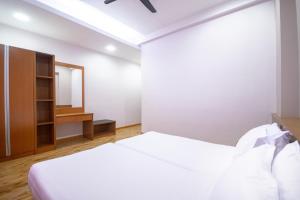 Letto o letti in una camera di Nova Highlands Hotel