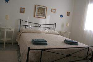 Letto o letti in una camera di I Ginepri B&B