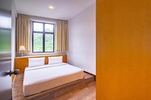 Letto o letti in una camera di Nova Highlands Hotel
