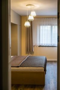 Posteľ alebo postele v izbe v ubytovaní Apartament Rakowicka 14 Deluxe Old Town WAWELOFTS
