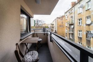 Balkón alebo terasa v ubytovaní Apartament Rakowicka 14 Deluxe Old Town WAWELOFTS