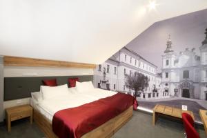 Posteľ alebo postele v izbe v ubytovaní Hotel Strážnice