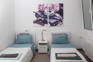 เตียงในห้องที่ Dimitras Apartment