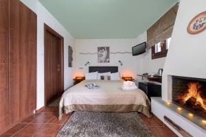 Postel nebo postele na pokoji v ubytování Hotel Petradi