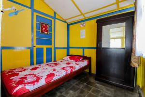 Krevet ili kreveti u jedinici u objektu Homestay Ndalem Soewondo