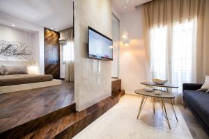 A bed or beds in a room at Privée Santorini