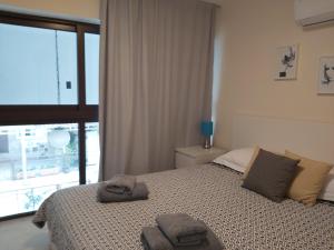 Postel nebo postele na pokoji v ubytování Galatex Beach Apartment
