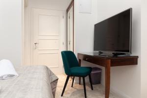 TV a/nebo společenská místnost v ubytování Luxury rooms Tilia