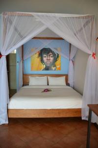 Vuode tai vuoteita majoituspaikassa Baan Jai Dee Beach Front Hotel