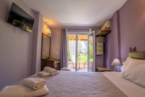 Fotografie z fotogalerie ubytování Tellis Holiday Rooms v destinaci Moraitika + 60 fotografií