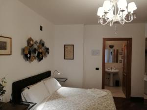 Postel nebo postele na pokoji v ubytování Leonardo Rome Holidays