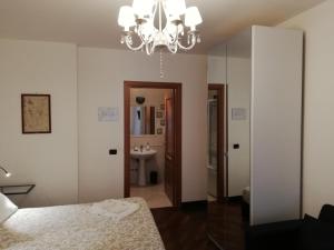 Postel nebo postele na pokoji v ubytování Leonardo Rome Holidays