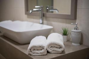 Kúpeľňa v ubytovaní Alianthos Suites
