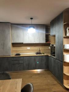 Η κουζίνα ή μικρή κουζίνα στο Apartament Malema