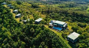 an aerial view of a house in the woods at Hotel Chalets Chamarel in Chamarel