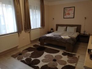 Posteľ alebo postele v izbe v ubytovaní Tulip Family Apartments