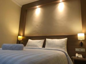 LCR HOTEL客房内的一张或多张床位