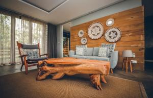 Area tempat duduk di Hotel Chalets Chamarel