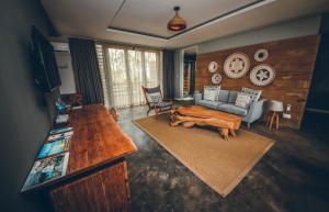 TV a/nebo společenská místnost v ubytování Hotel Chalets Chamarel