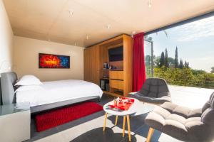 Кровать или кровати в номере THE ADDRESS CASSIS