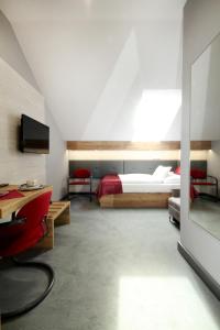 Posteľ alebo postele v izbe v ubytovaní Hotel Strážnice