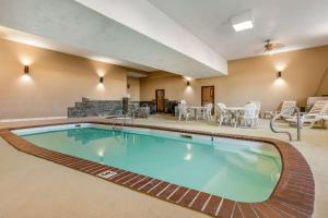The swimming pool at or close to Rodeway Inn Rapid City