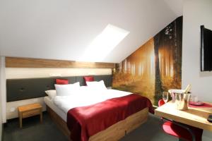 Posteľ alebo postele v izbe v ubytovaní Hotel Strážnice