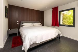 Кровать или кровати в номере THE ADDRESS CASSIS