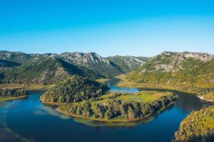 an aerial view of a river in the mountains at Iberostar Waves Slavija in Budva
